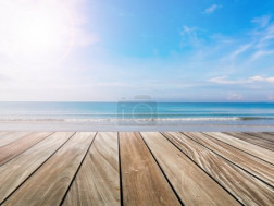 wood terrace on the beach and sun light