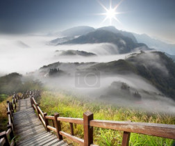 Dramatic clouds with mountain and tree