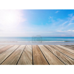 wood terrace on the beach and sun light