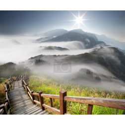 Dramatic clouds with mountain and tree